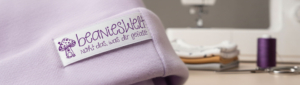 BeaniesWelt Logo als gesticktes Label zum Branding von Produkten